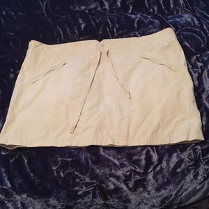 Cream colored draw string skirt.